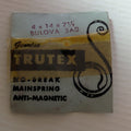 Trutex no-break mainspring packaging on a light wooden surface