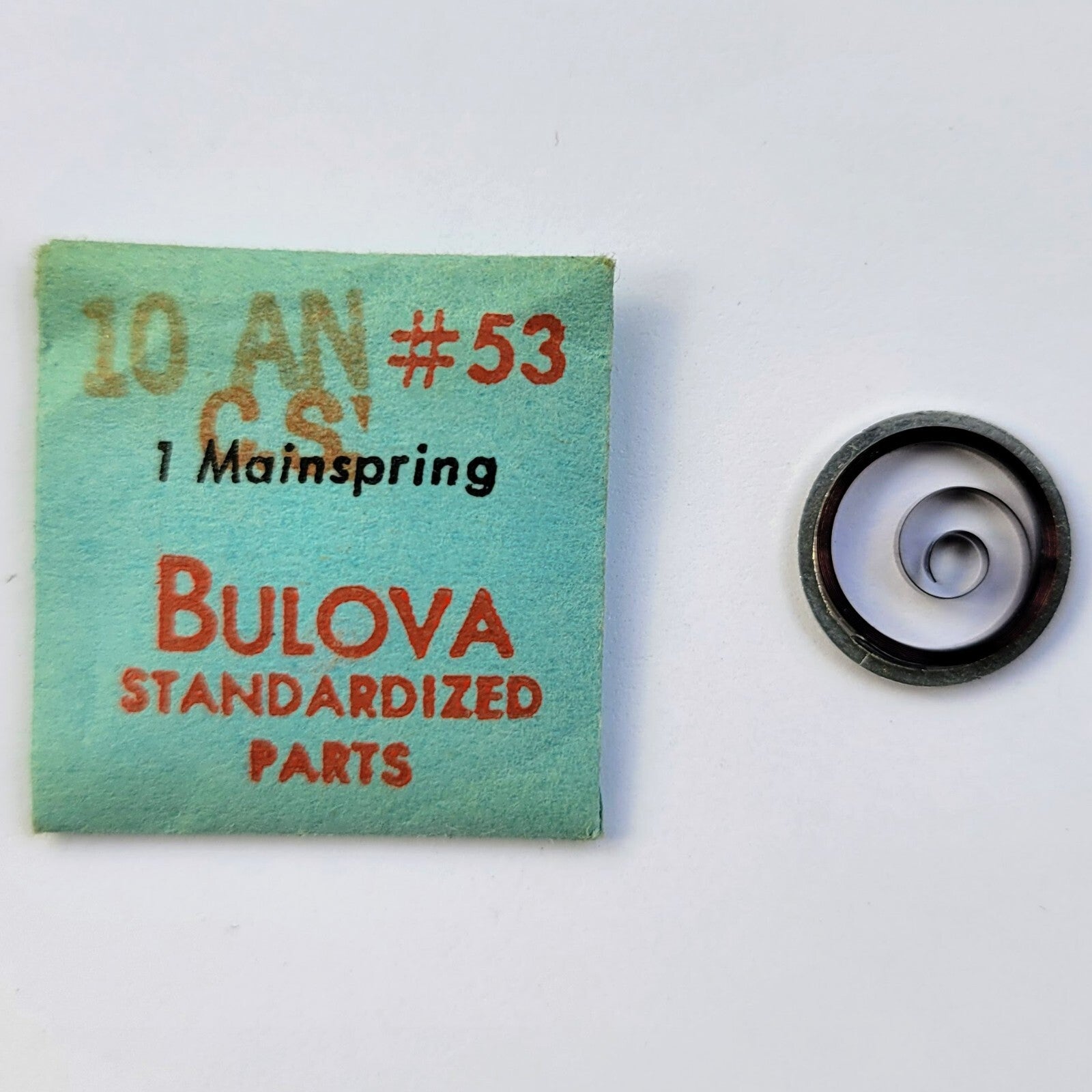 Bulova standardized parts label with a mainspring on a white background